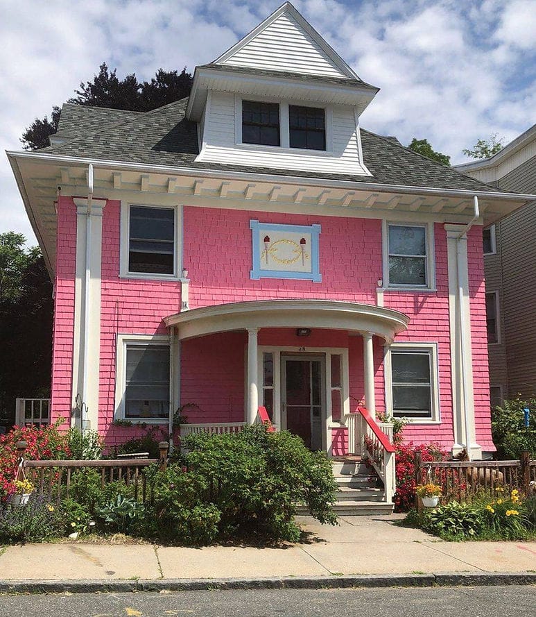 Exterior view of a colorful senior care facility