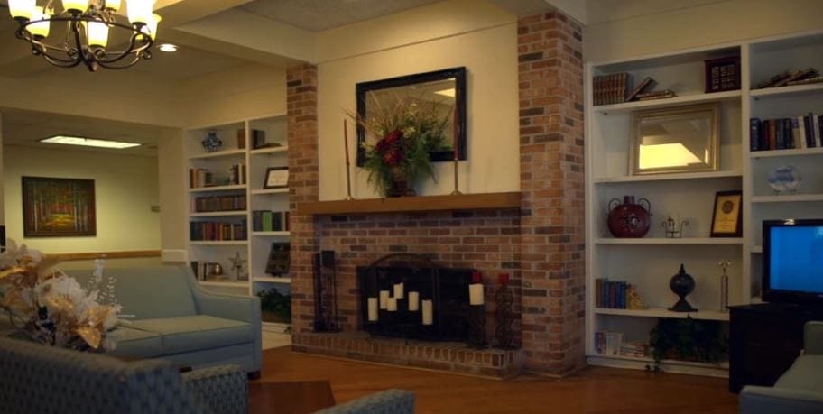Cozy common area with seating and a fireplace