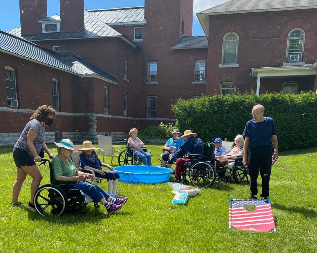 Residents enjoying outdoor activities on a sunny day