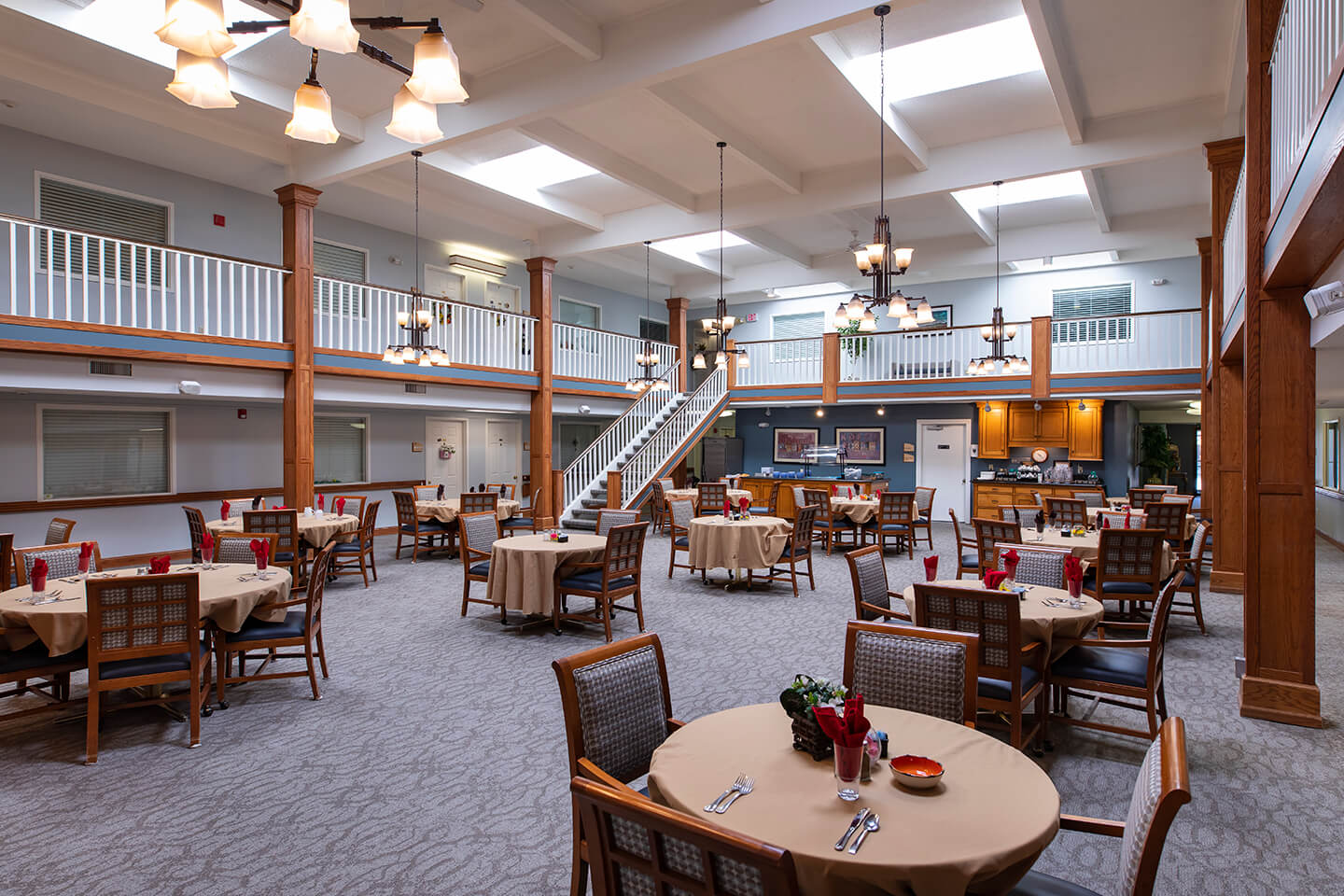 Bright dining area with round tables and chairs