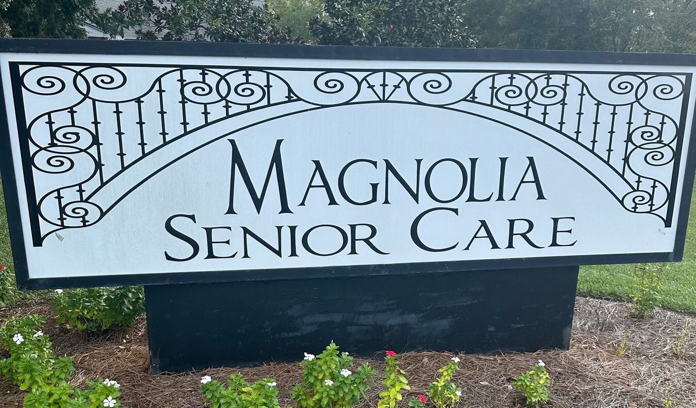 Facility sign with name Magnolia Senior Care