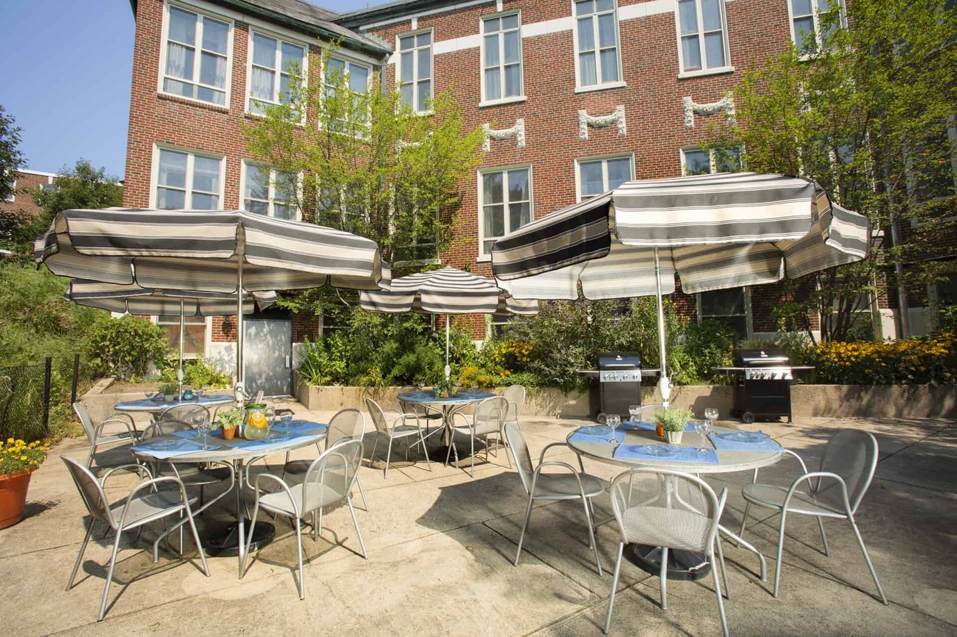 Outdoor seating area with umbrellas and tables