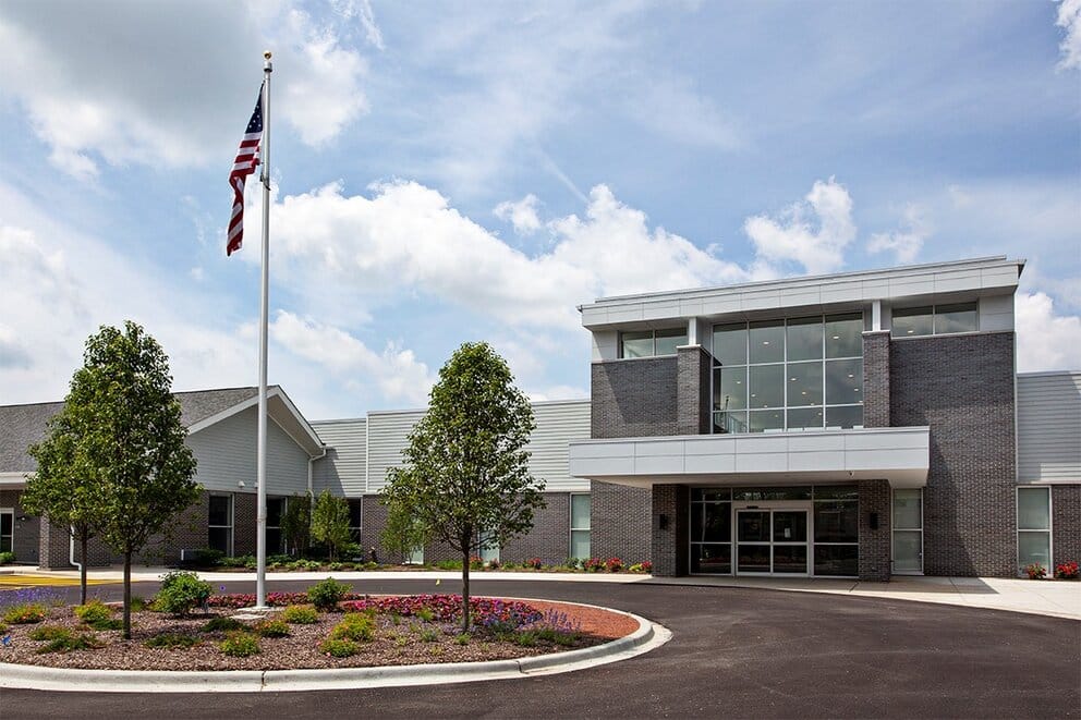 Exterior view of the facility with landscaping