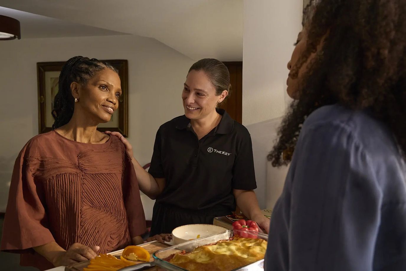 Caregiver interacting with resident over food