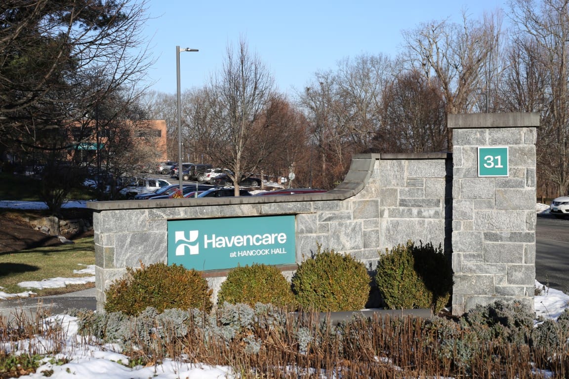 Entrance sign for Hancock Hall facility