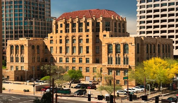 Exterior view of a large building with architectural features.