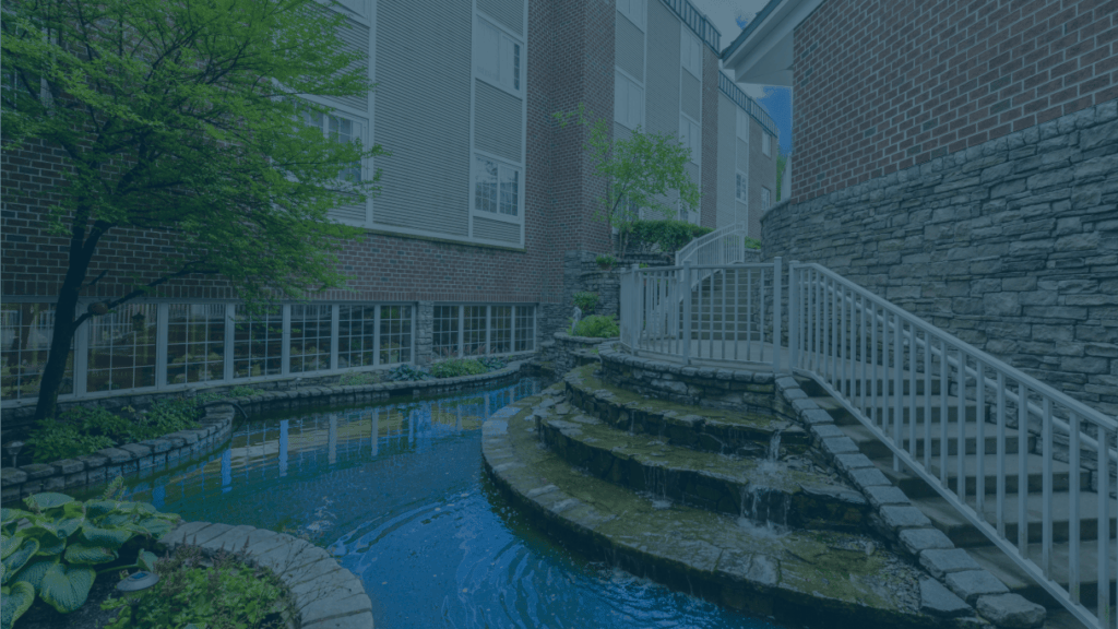 Water feature and garden area near facility