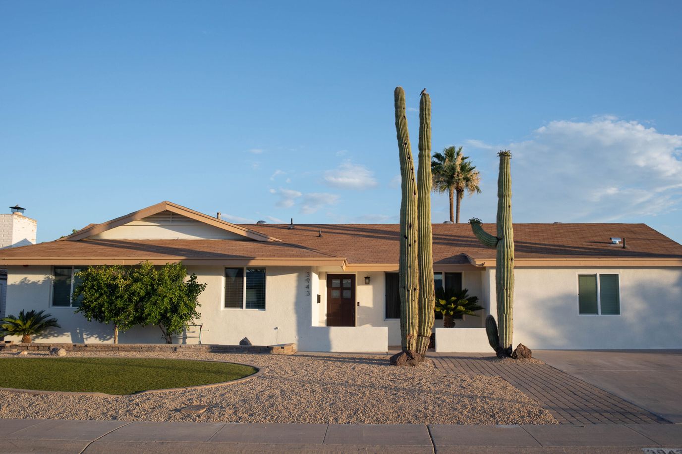 Exterior view of a senior living facility with landscaping