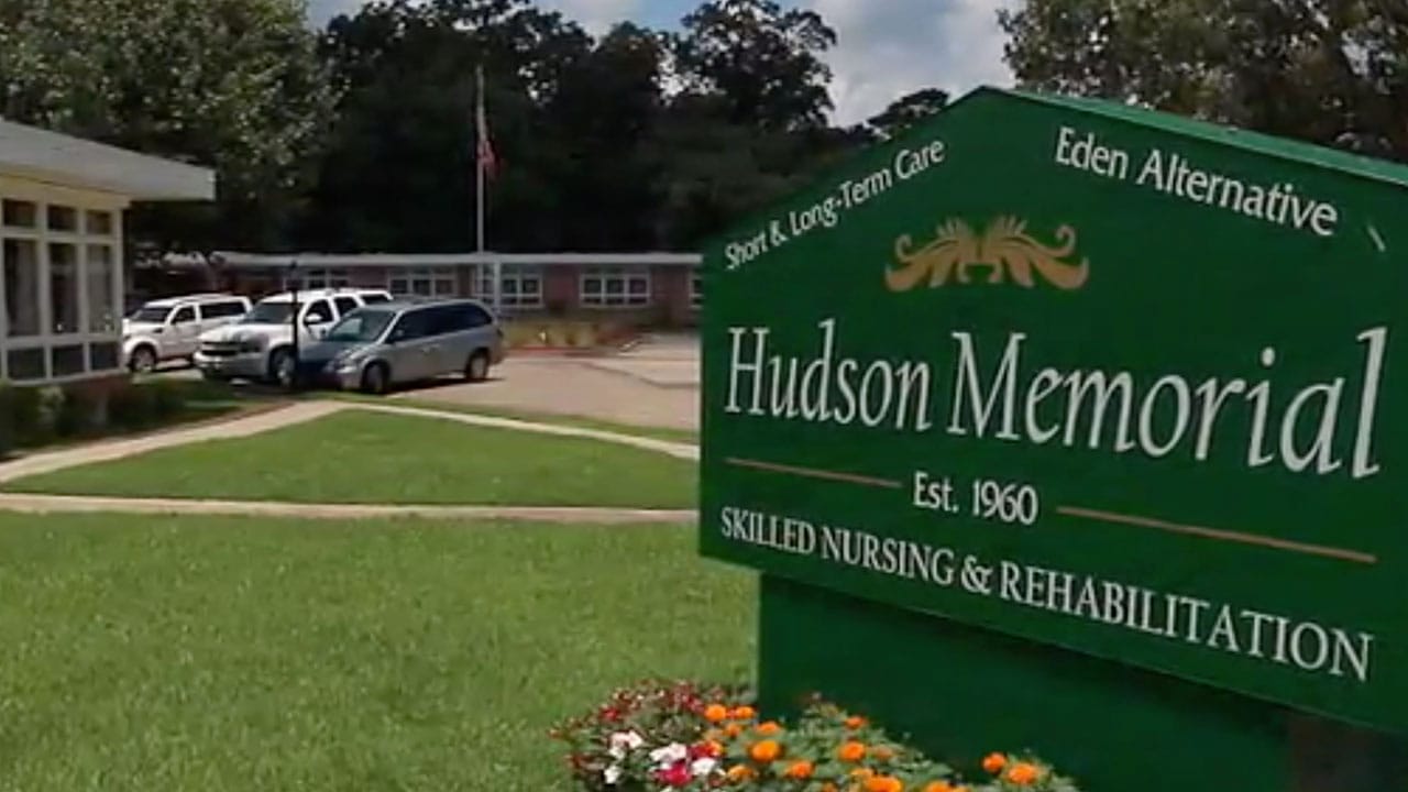 Exterior view of Hudson Memorial Nursing Home sign