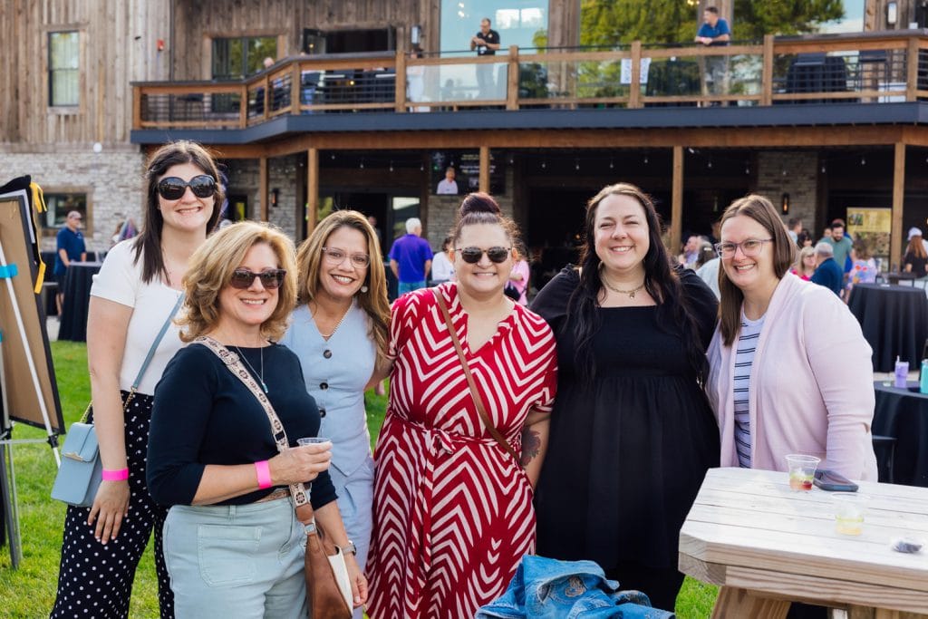 Group of smiling women outside the facility