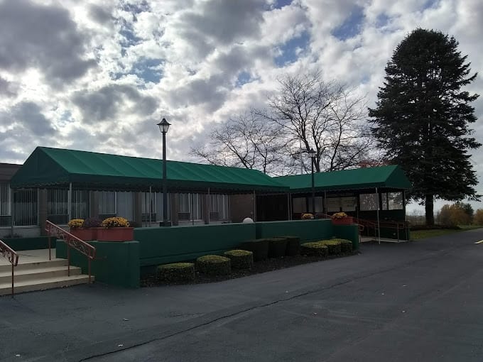 Exterior view of Eden Heights with green awning