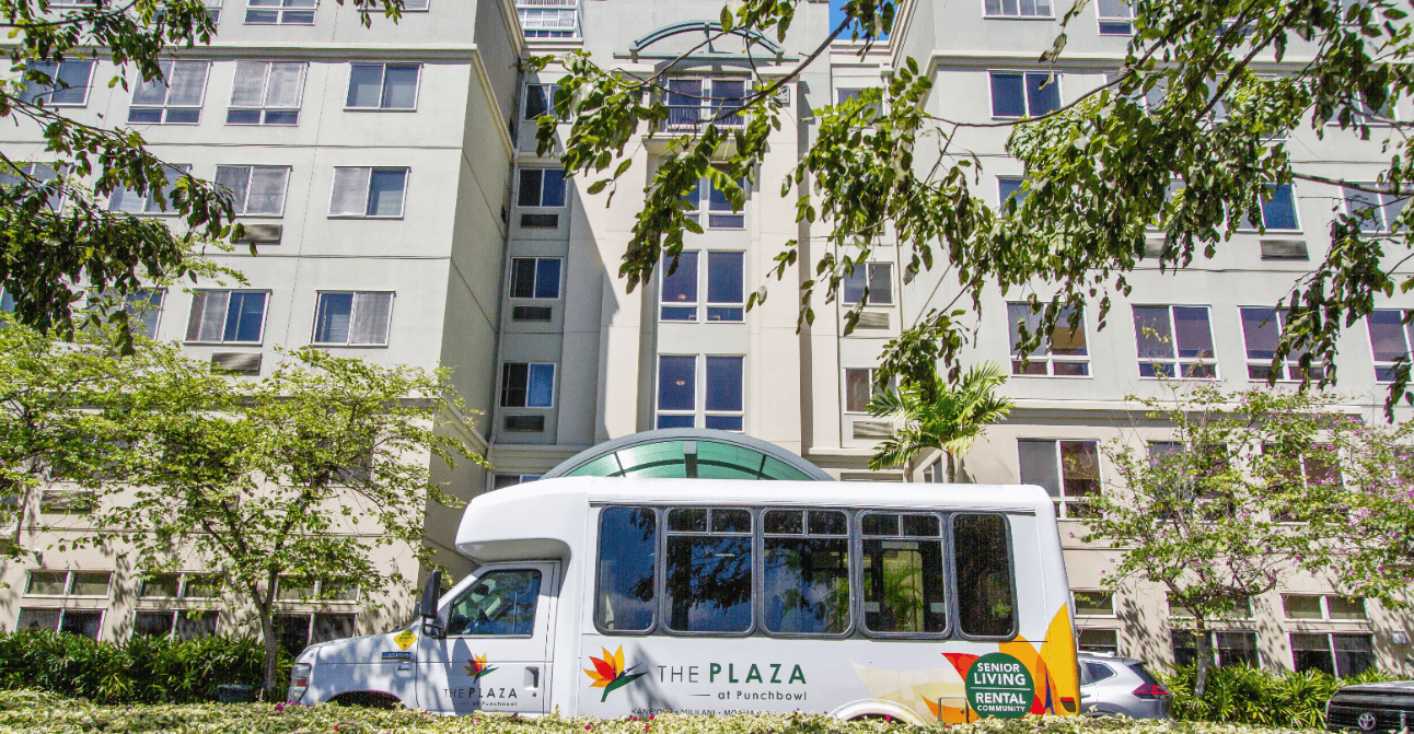 Facility transport bus in front of the building