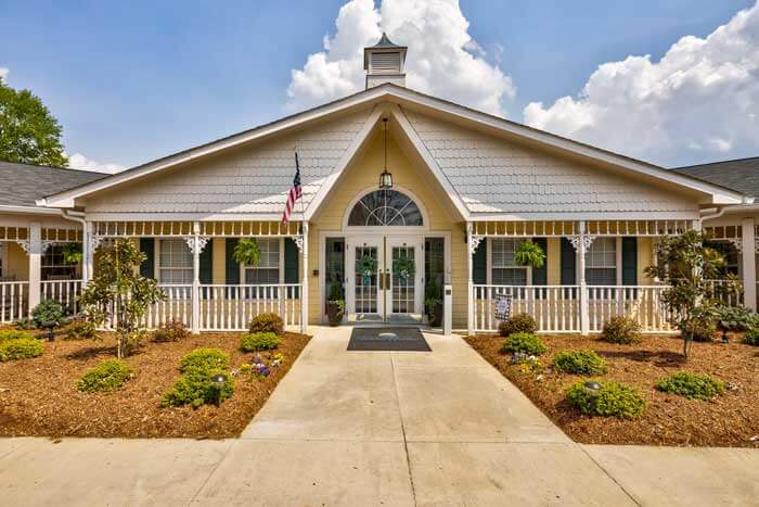 Front entrance with garden at Bella Gardens Senior Living