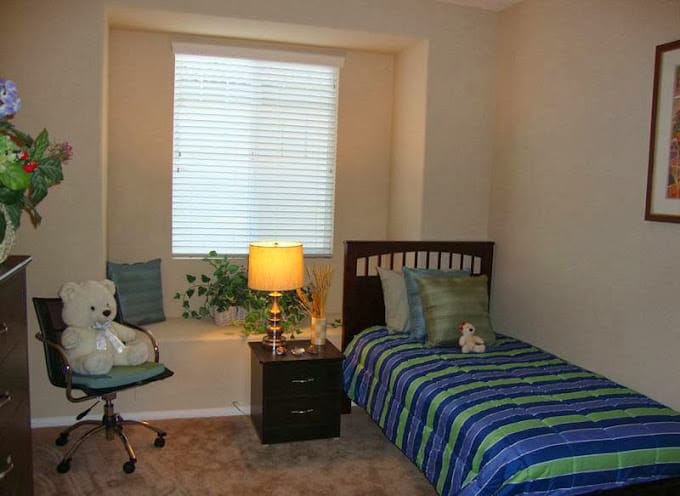 Cozy bedroom with a bed and teddy bears