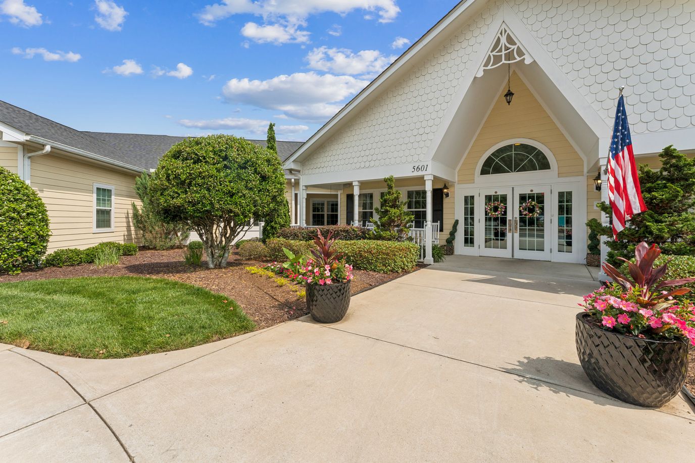 Exterior view of the facility entrance with landscaping