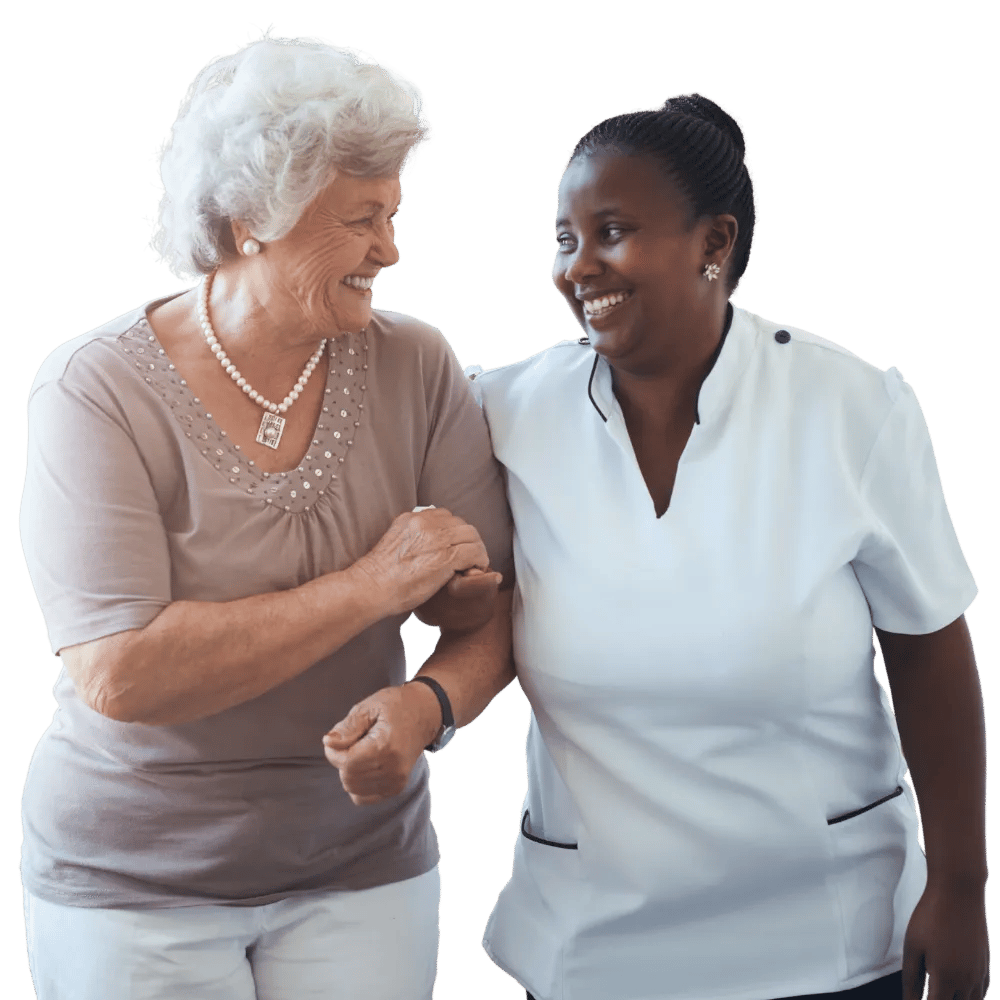Senior resident joyfully interacting with caregiver.