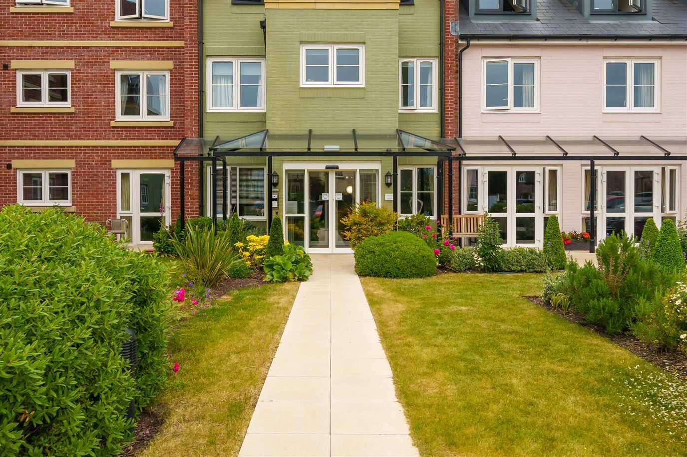 Exterior view of a welcoming assisted living facility.
