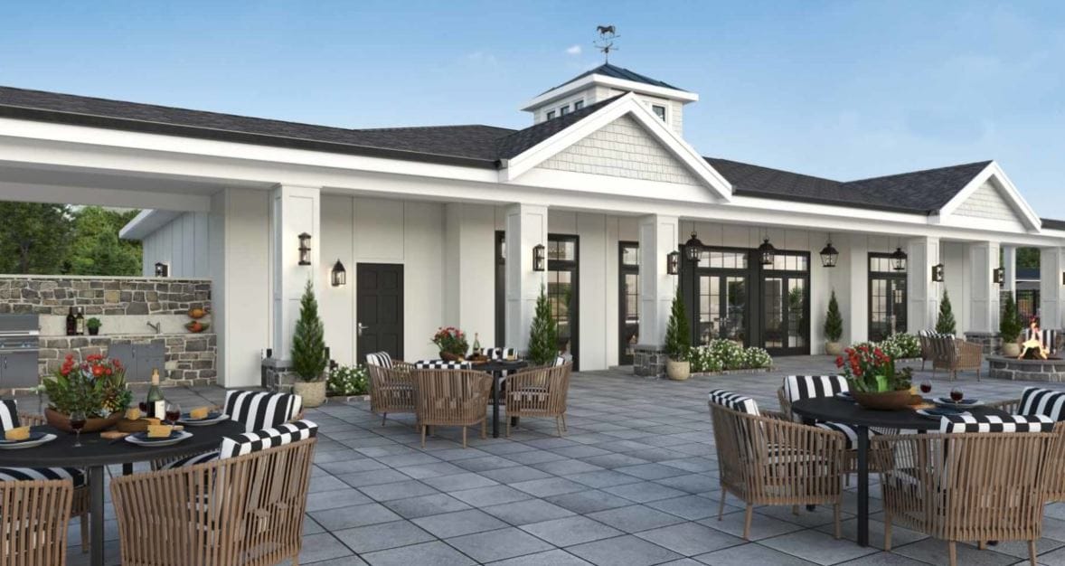 Outdoor patio area with tables and chairs
