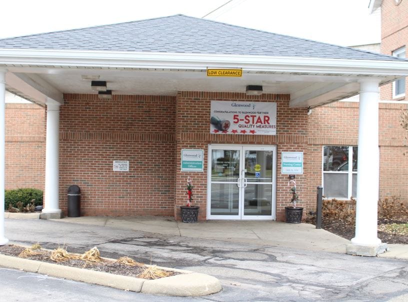 Entrance of Glenwood Assisted Living facility with signage.