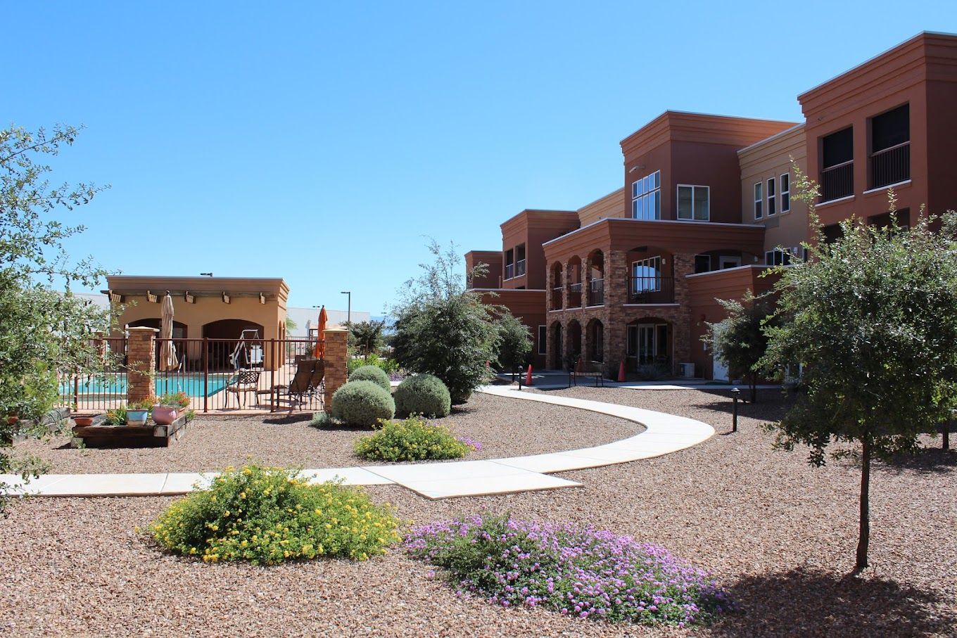 Exterior view of Mountain View Gardens with landscaped pathways