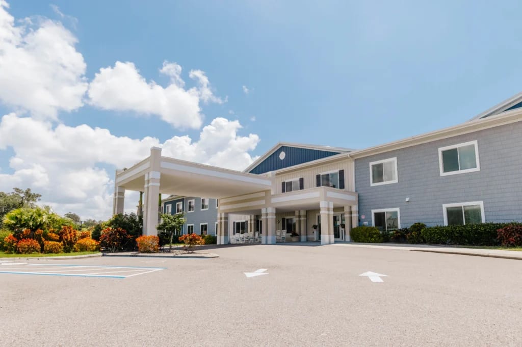 Exterior view of the facility building with landscaping