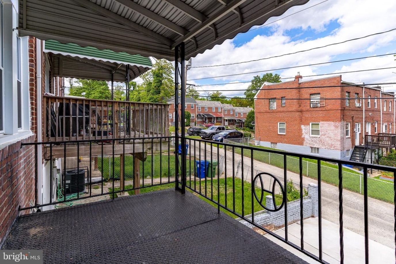 Outdoor patio area with view of buildings