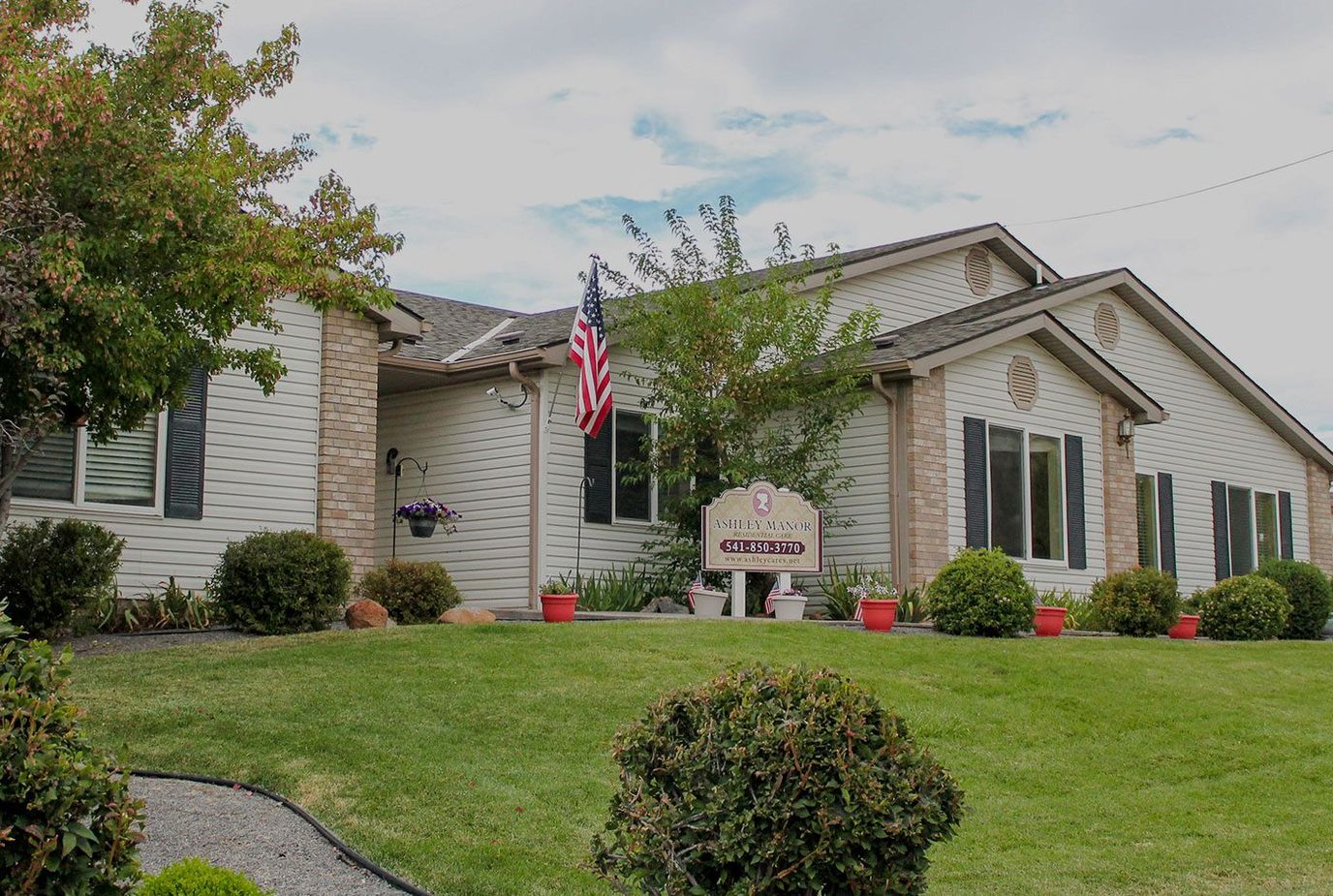 Exterior view of Ashley Manor with landscaping