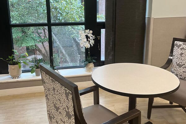 Interior common area with a table and chairs
