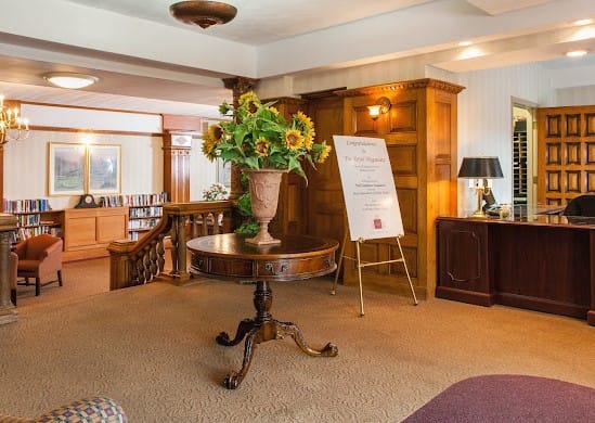 Interior view of a welcoming lobby area with wooden accents