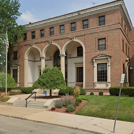 Exterior view of a brick building with arches