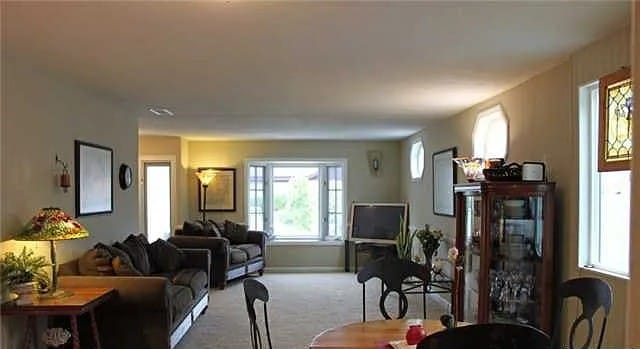 Bright common area with seating and natural light