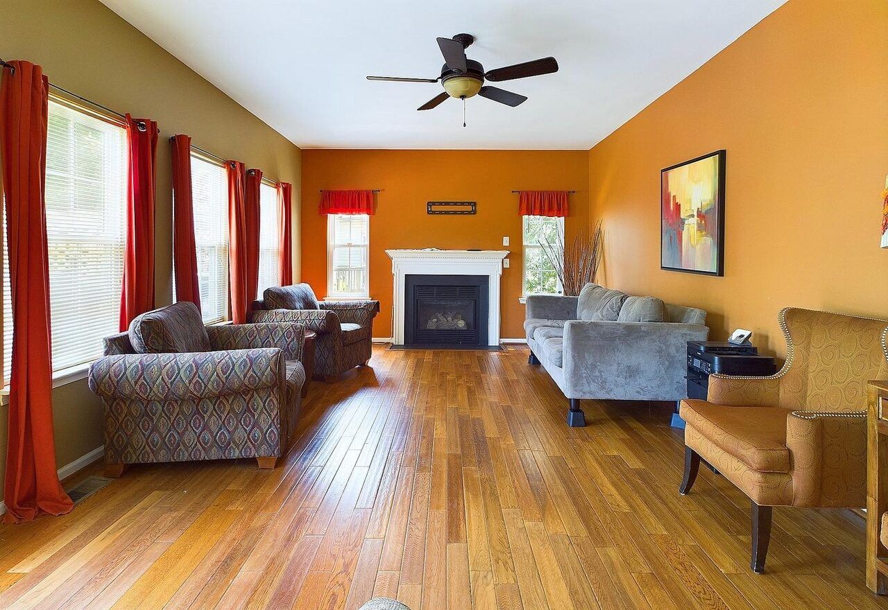 Cozy common area with seating and a fireplace
