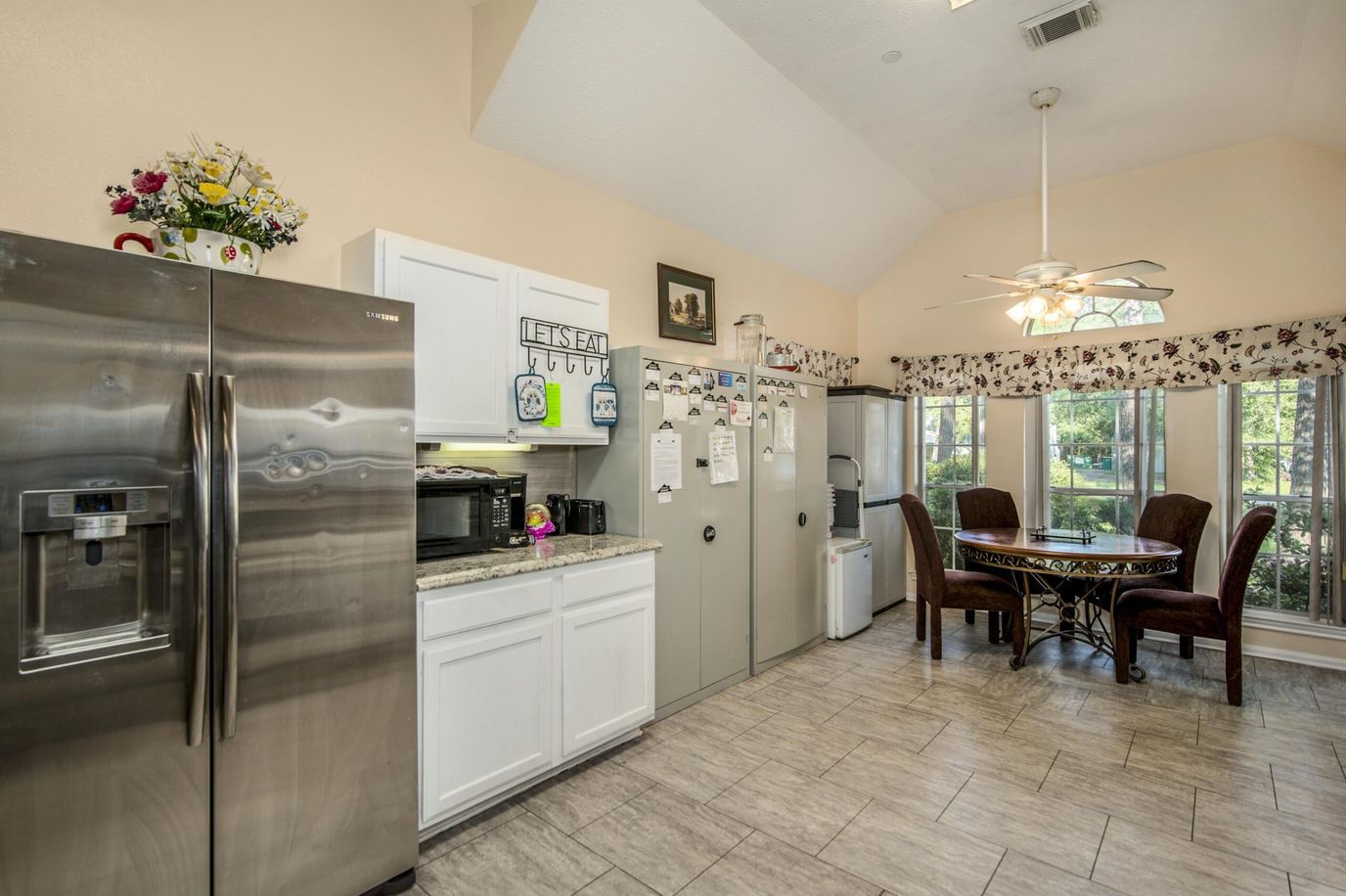 Modern kitchen area with seating for dining