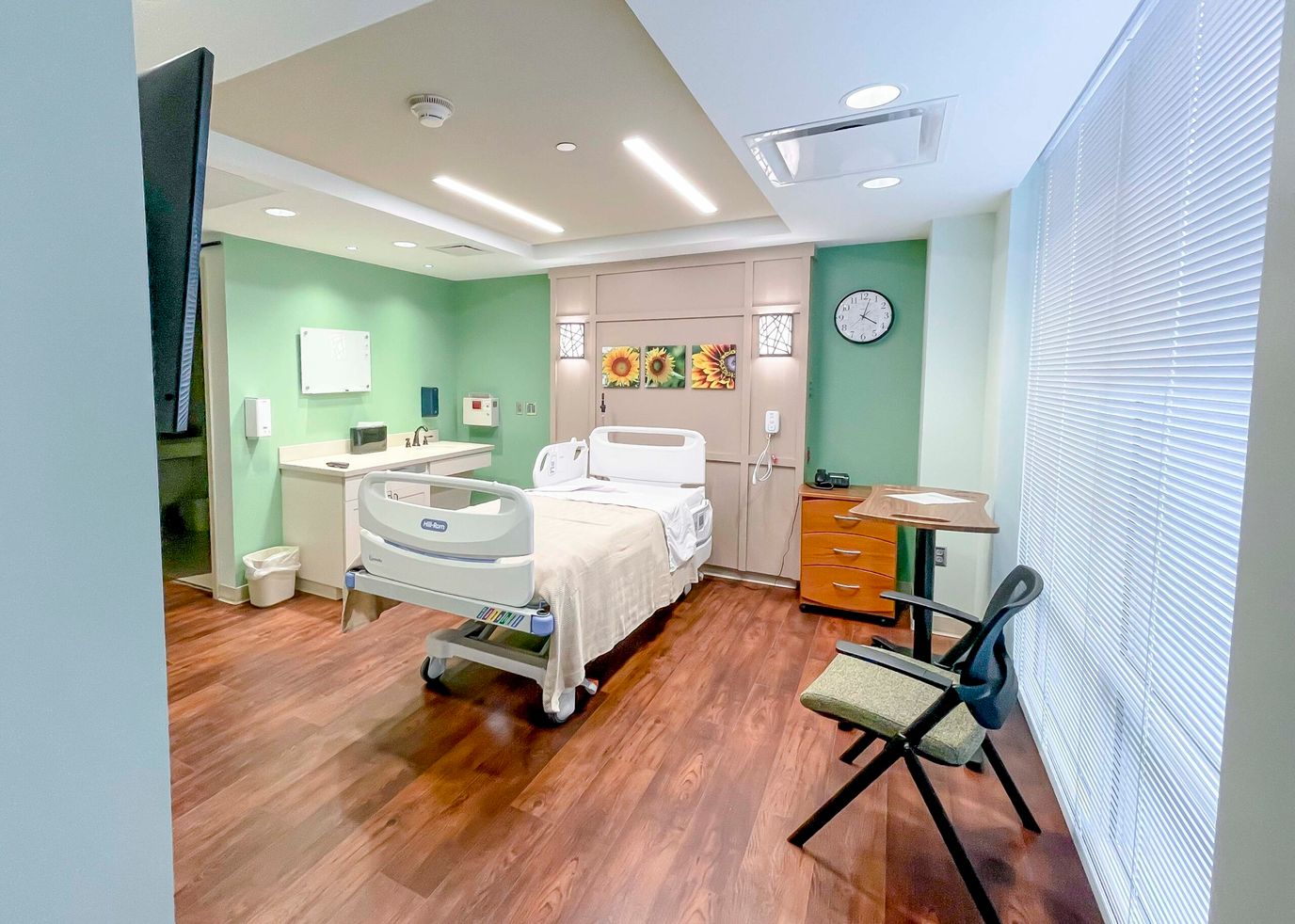 Private resident room with bed and furnishings