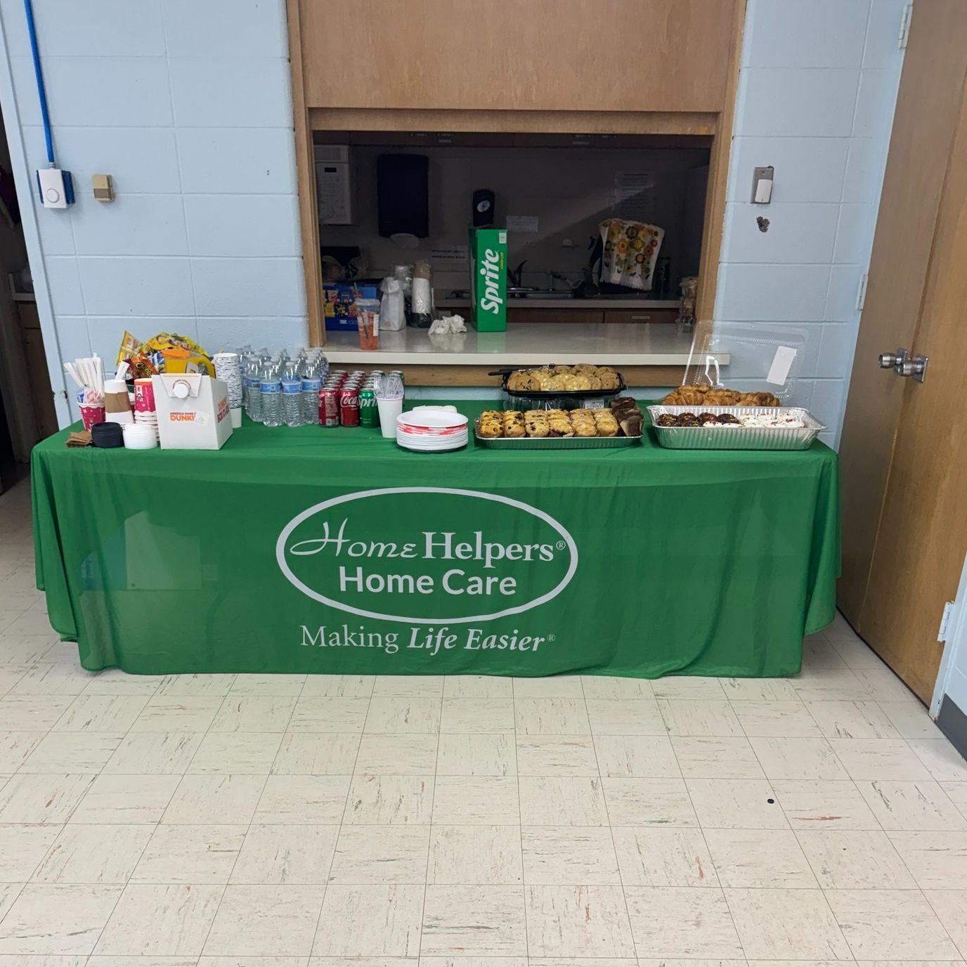 Table set up with snacks and drinks in a common area