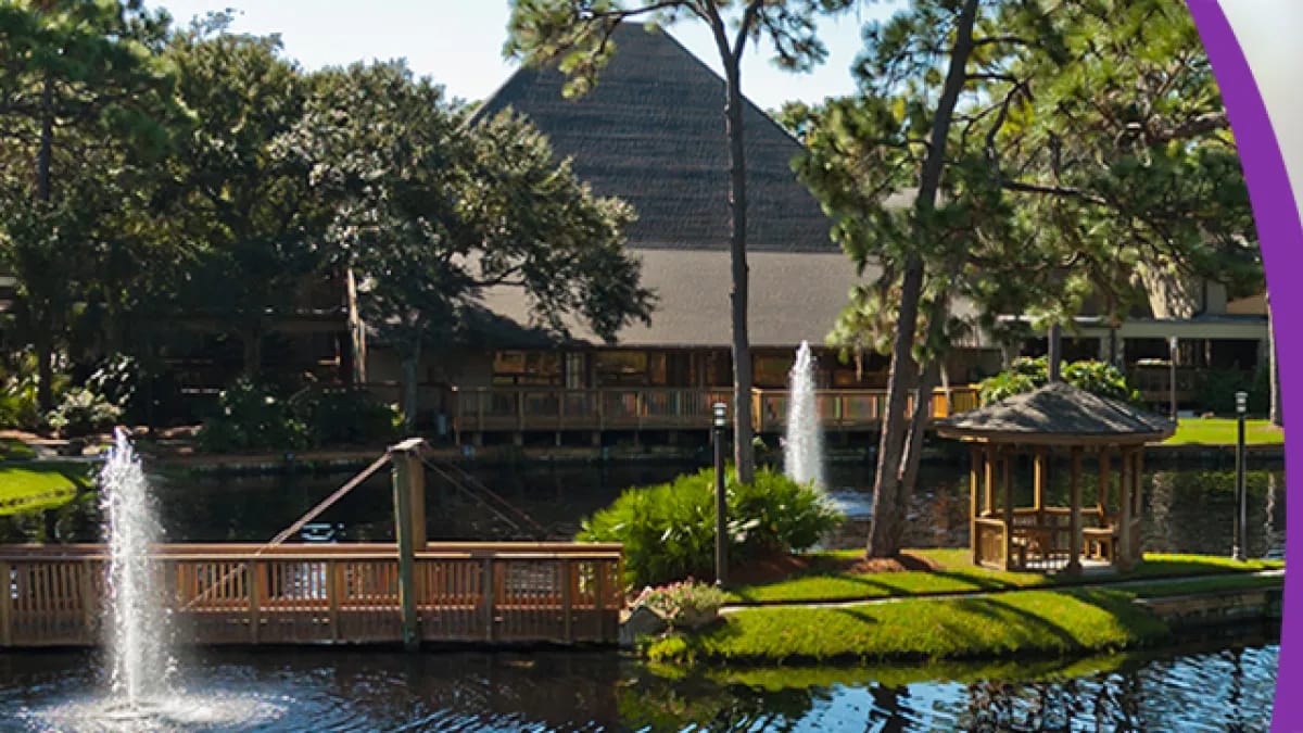 Outdoor view of the facility by a pond