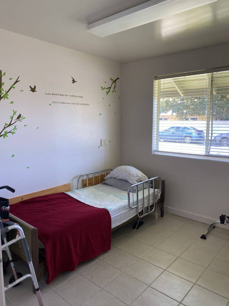 Interior shot of a resident room with a single bed