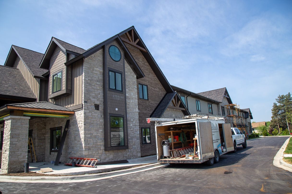 Exterior view of a new assisted living facility under construction