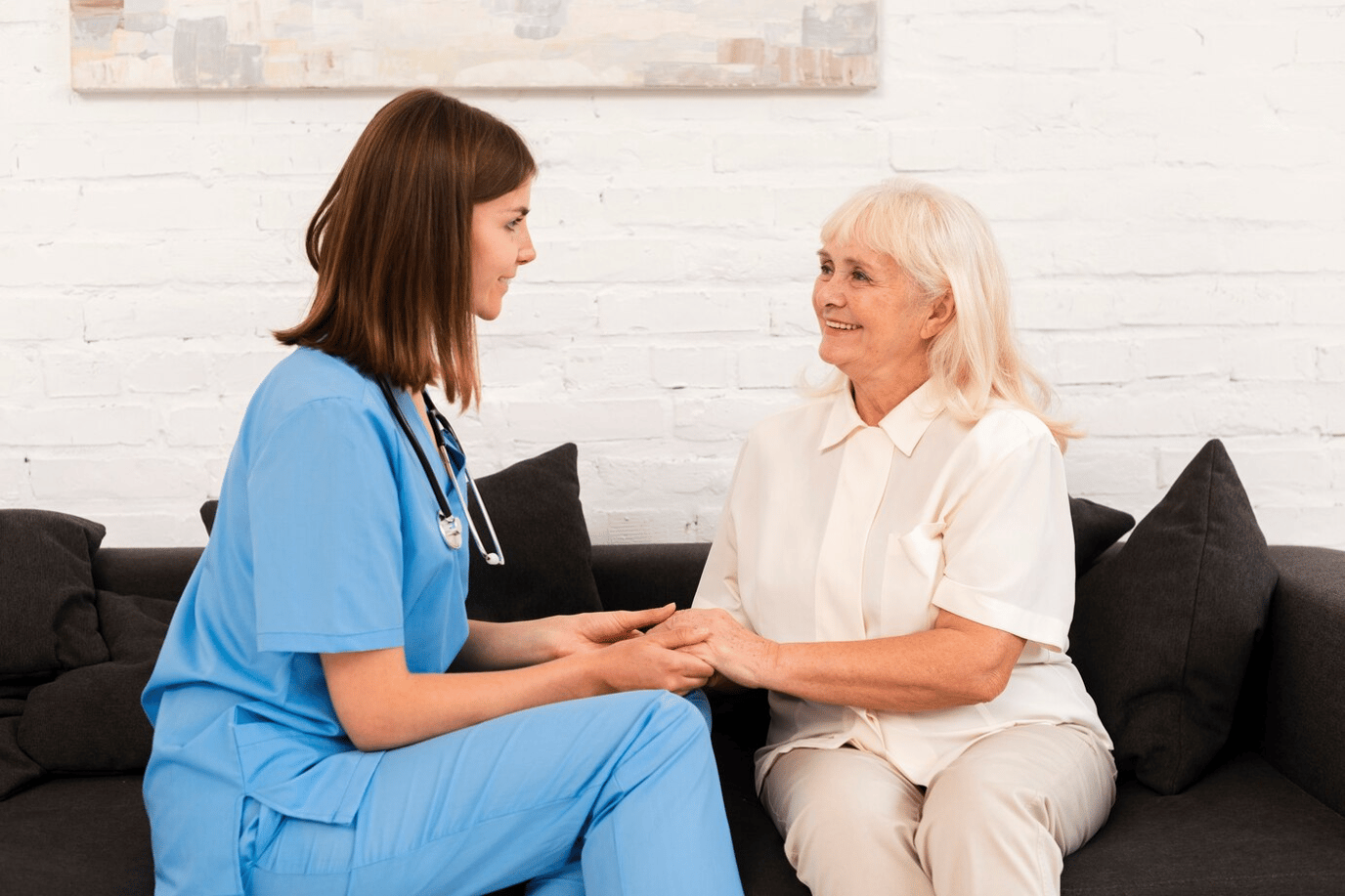 Caregiver interacting with a senior resident