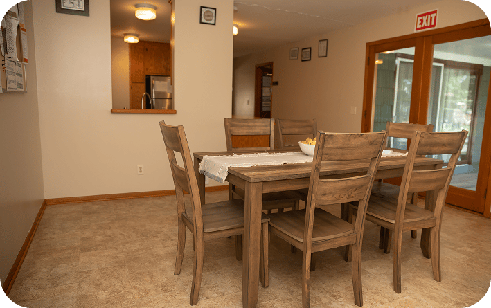 Dining area with a wooden table and chairs