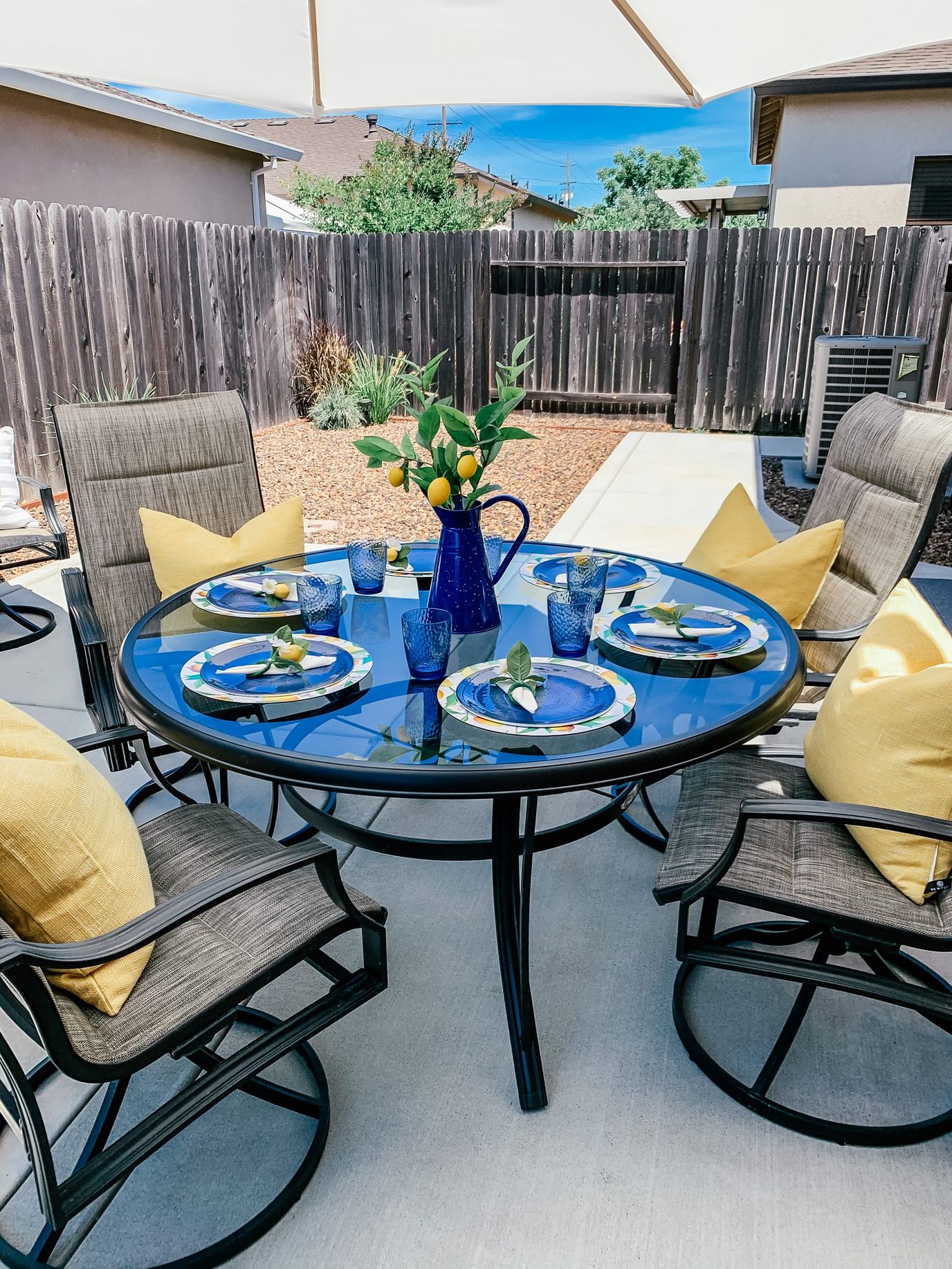 Outdoor dining table set with colorful decor