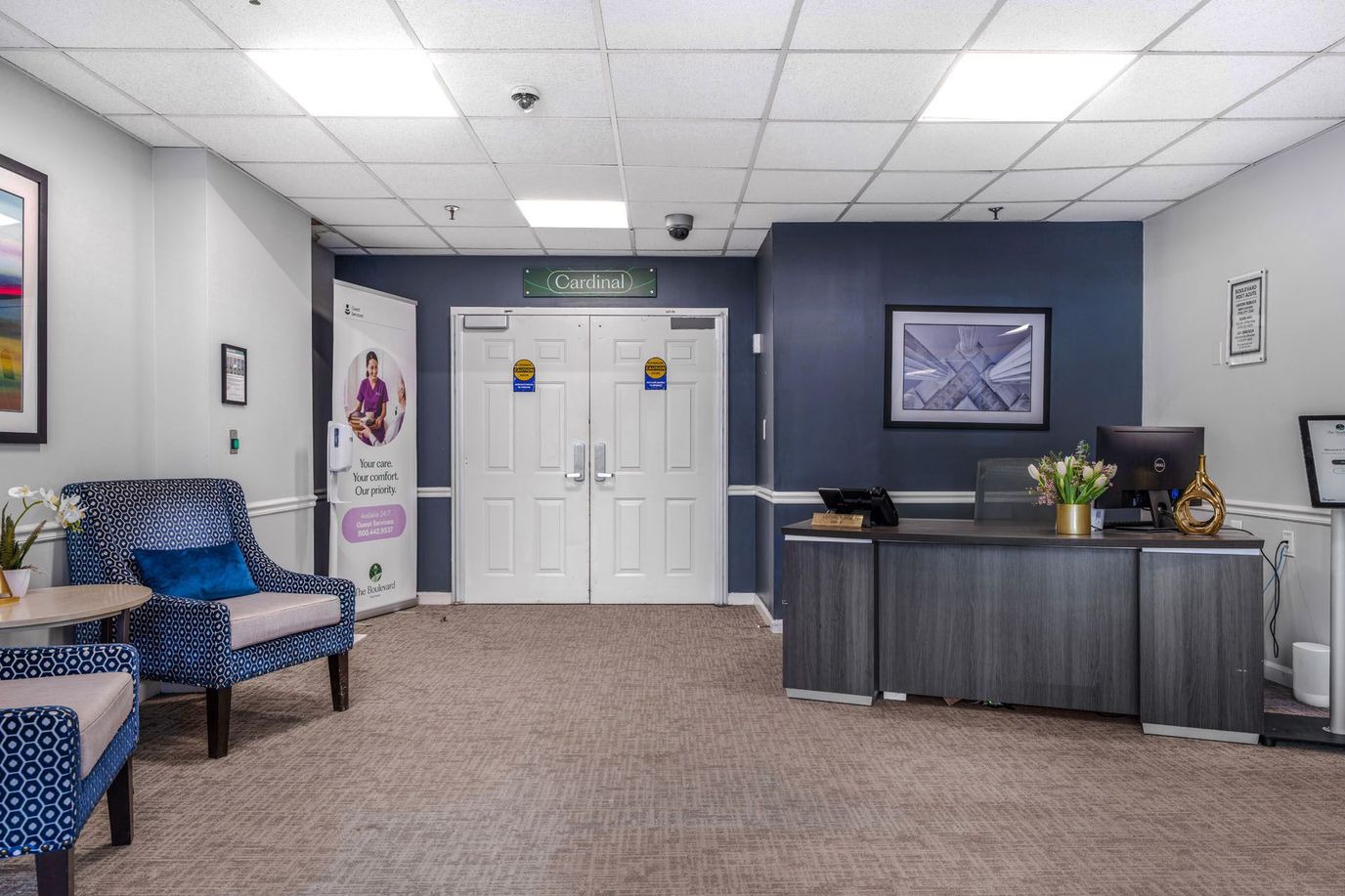 Interior lobby area with seating and reception desk