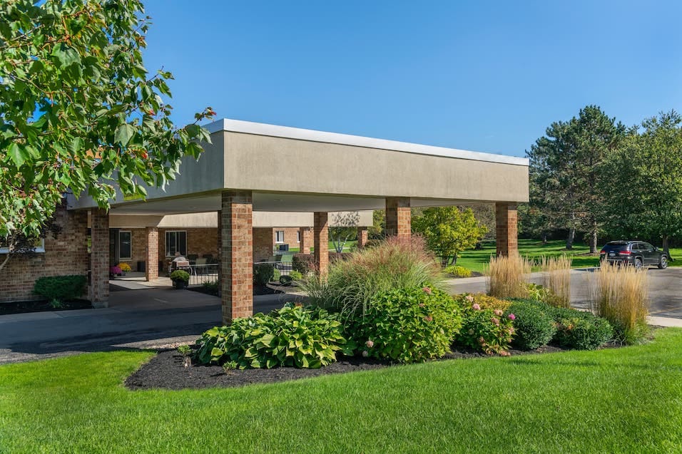 Exterior view of the facility entrance and landscaping