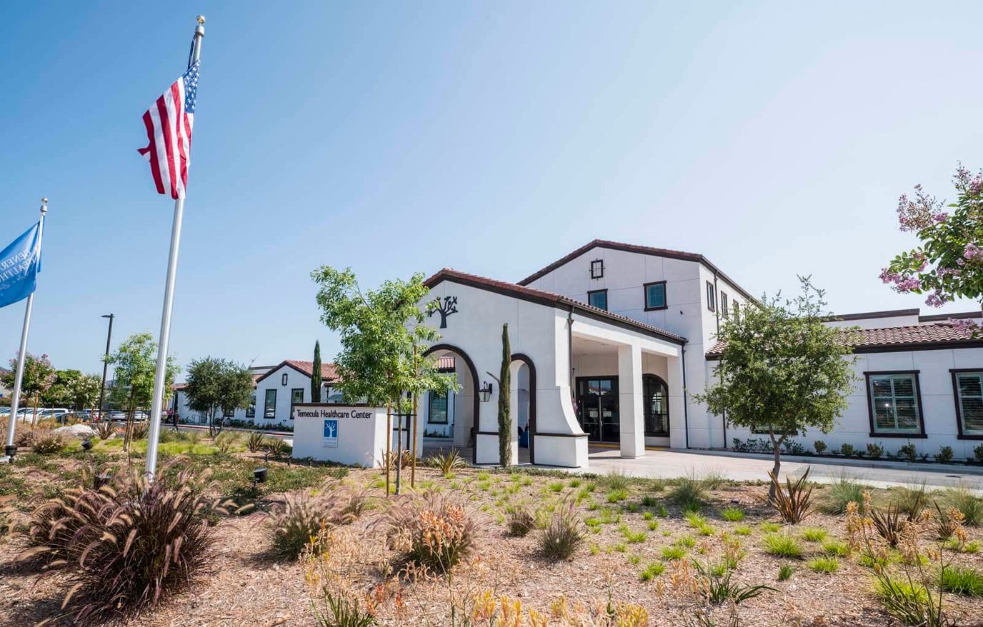 Exterior view of the nursing facility with landscaping