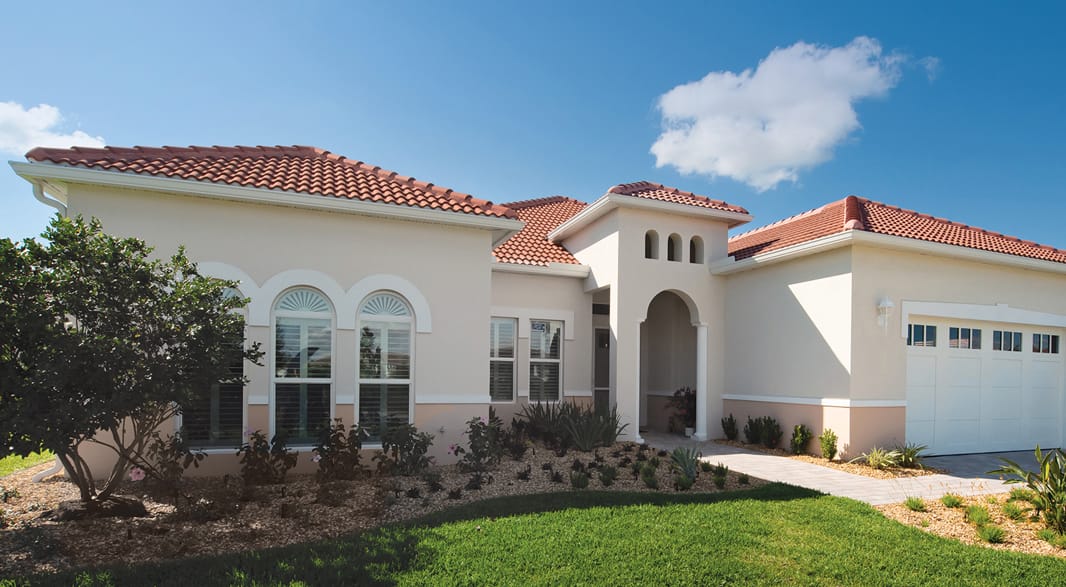 Exterior view of a senior living facility with landscaping