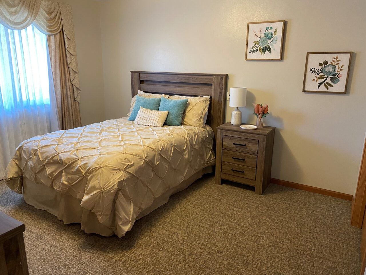 Cozy private resident room with bed and decor