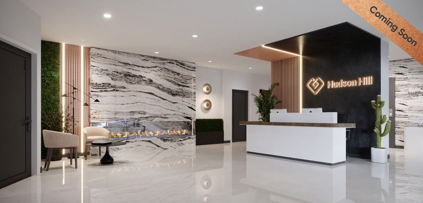 Contemporary lobby with seating and decorative elements