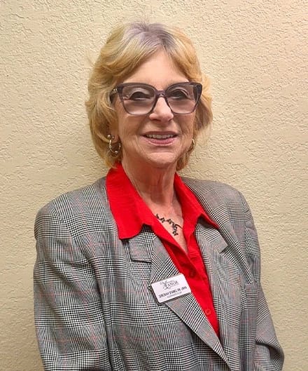 Staff member posing for a photo