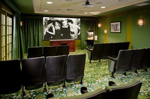 Decorated movie theater room with seating