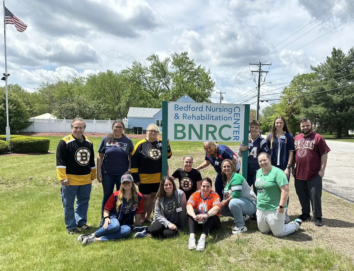 Group photo of staff outside Bedford Nursing and Rehabilitation Center